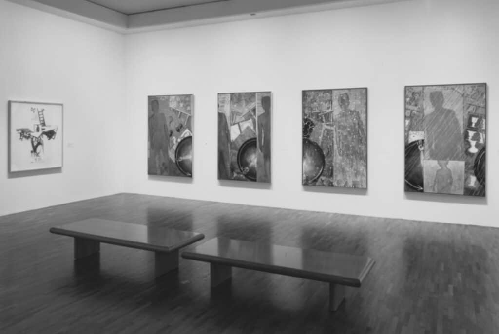 Jasper Johns "The Seasons" paintings installed at MoMA, 1996. Black and white photo.